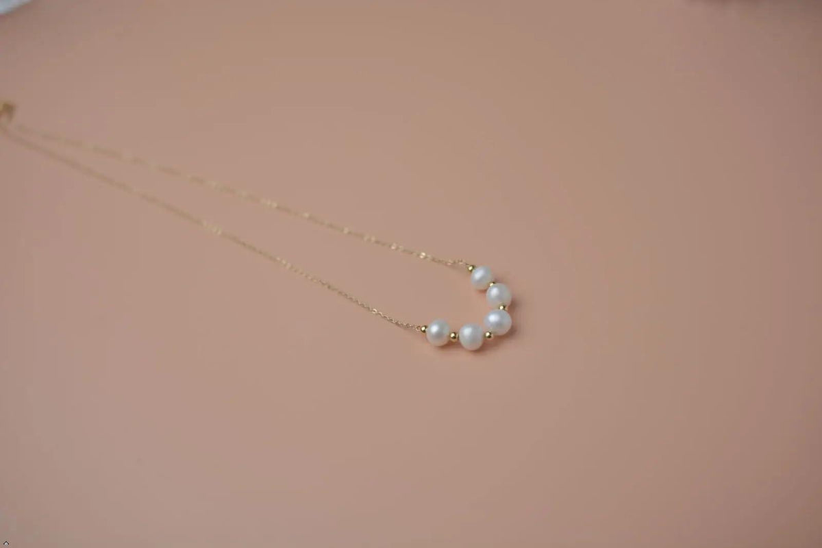 Natural Freshwater Pearl and 18 K Gold Smile Necklace